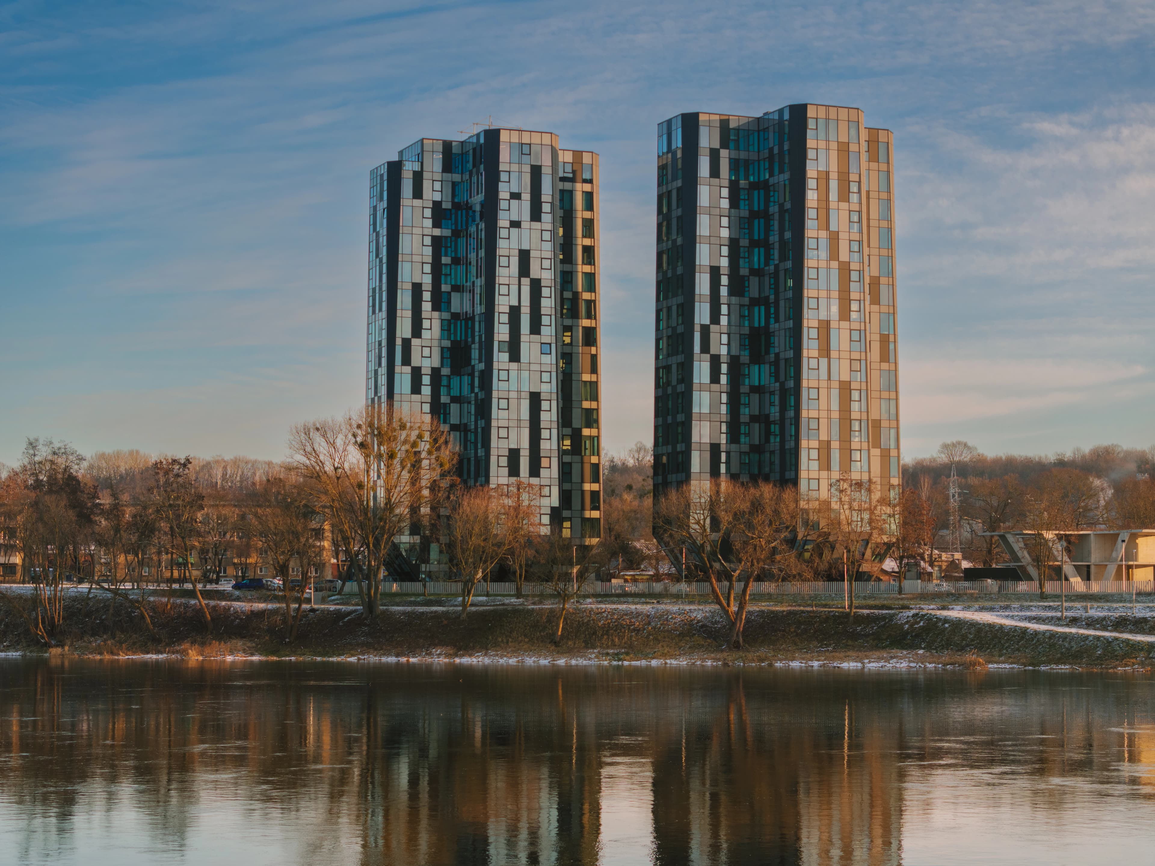 City landscape with river and modern architecture
